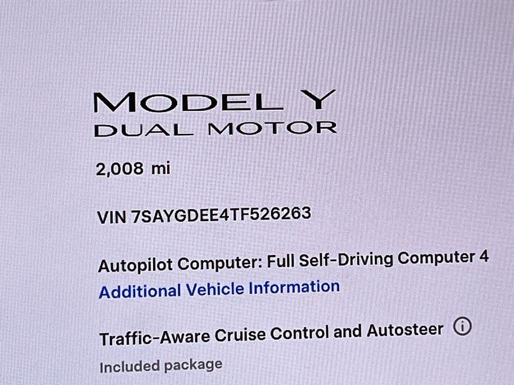 2026 Tesla Model Y Long Range White at AutoSavvy Houston Northwest