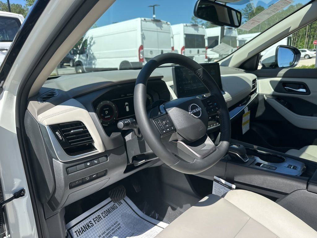 2025 Everest White Pearl Nissan Rogue SL FWD SUV