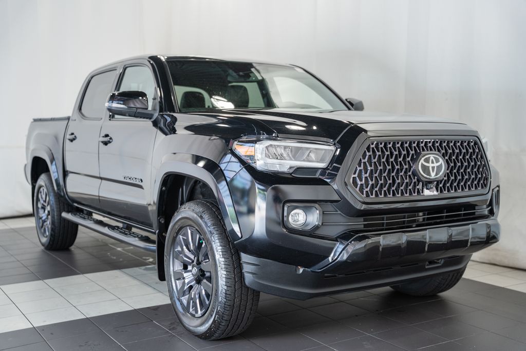 Midnight Black Metallic 2021 Toyota Tacoma Pickup Truck Four-Wheel Drive 6-Speed Automatic