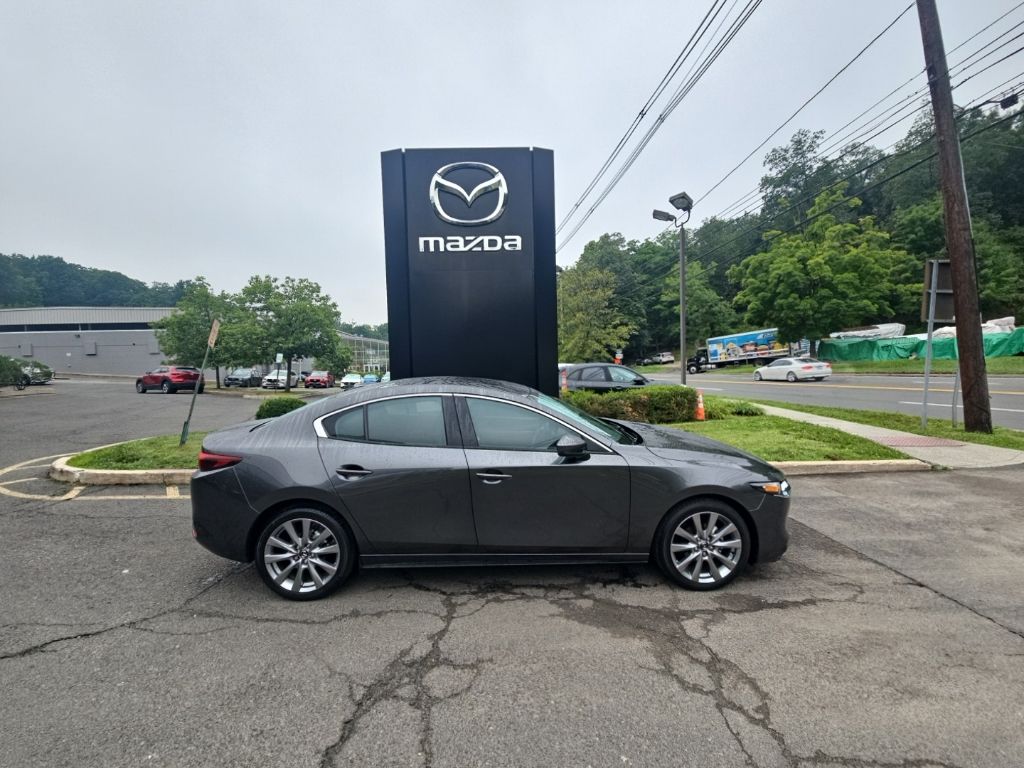 Machine Gray Metallic 2026 Mazda MAZDA3 Sedan Front-Wheel Drive 6-Speed Automatic