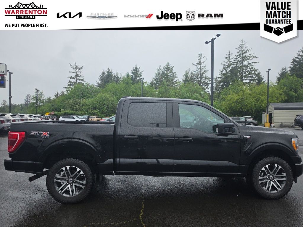 View vehicle photo 4