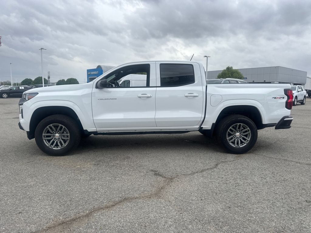 View vehicle photo 3