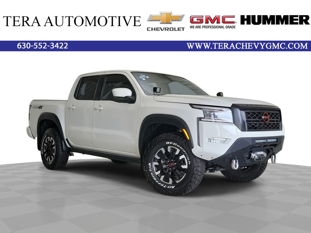 Glacier White 2024 Nissan Frontier Pickup Truck Four-Wheel Drive 9-Speed Automatic Overdrive
