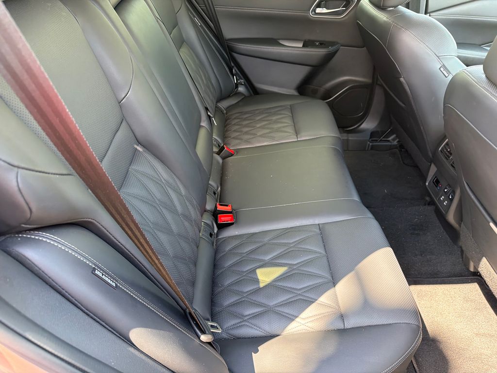 Used 2024 Gold Nissan Platinum image 13