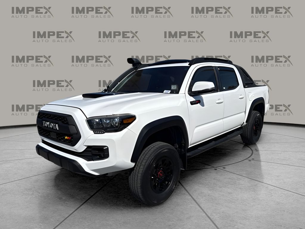 Super White 2019 Toyota Tacoma Pickup Truck Four-Wheel Drive 6-Speed Manual