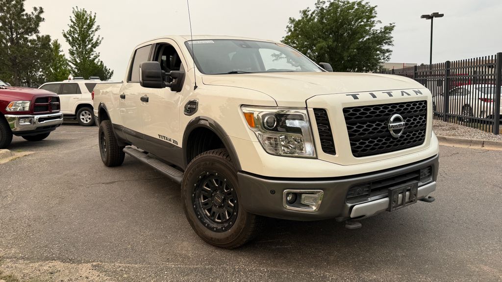 Pearl White 2017 Nissan Titan Pickup Truck Four-Wheel Drive 6-Speed Automatic