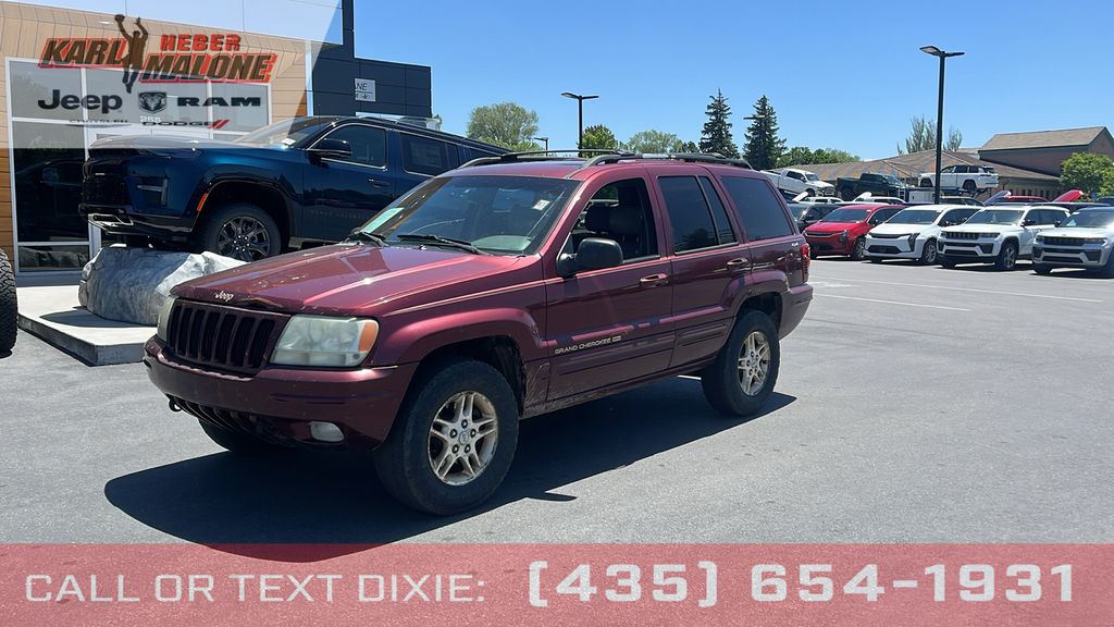 Red 1999 Jeep Grand Cherokee Limited 4WD SUV / Crossover Four-Wheel Drive 4-Speed Automatic