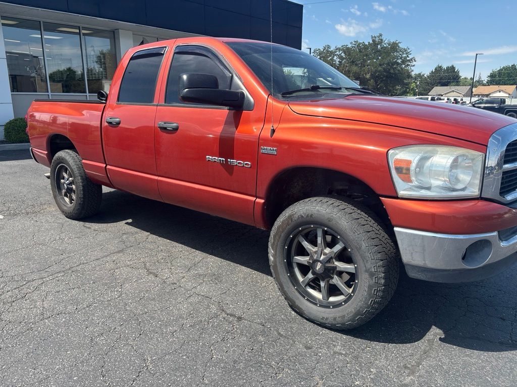 Sunburst Orange Pearl 2007 Dodge RAM 1500 Pickup Truck Four-Wheel Drive 5-Speed Automatic