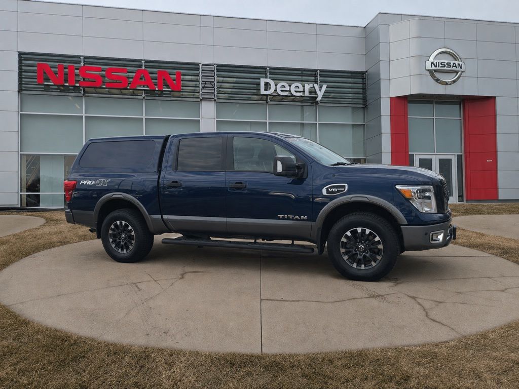 Deep Blue Pearl 2017 Nissan Titan Pickup Truck Four-Wheel Drive 7-Speed Automatic