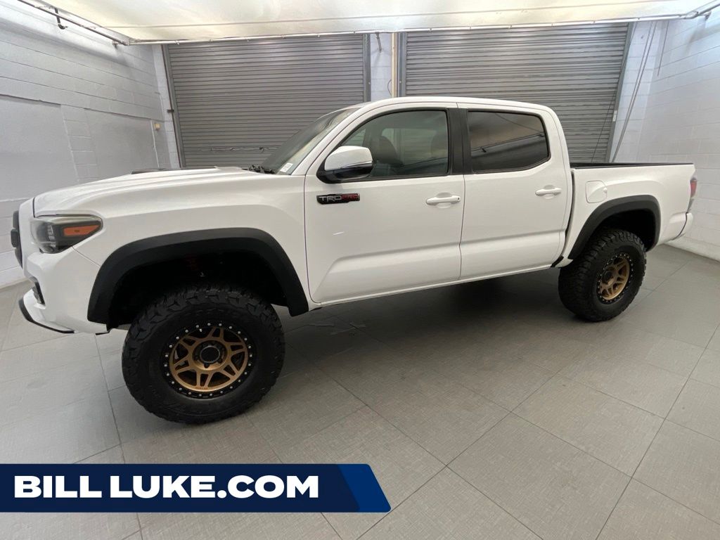 Super White 2017 Toyota Tacoma Pickup Truck Four-Wheel Drive 6-Speed Manual