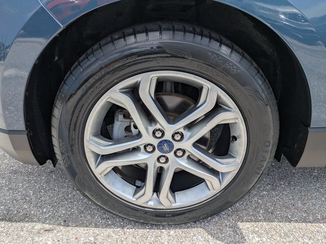 Used 2016 Blue Metallic Ford Titanium image 11