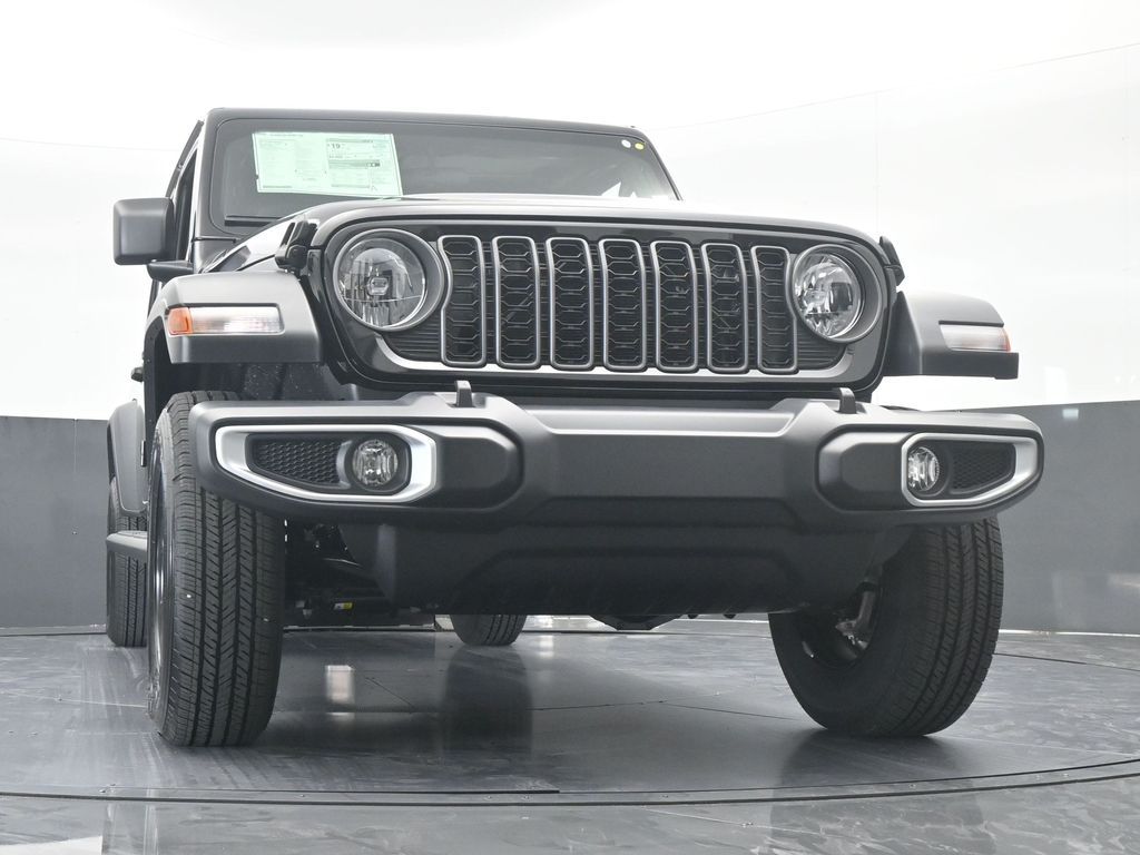 New 2026 black clearcoat Jeep Sport image 57