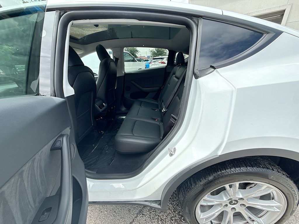 2024 Tesla Model Y Long Range White at AutoSavvy Houston Southwest
