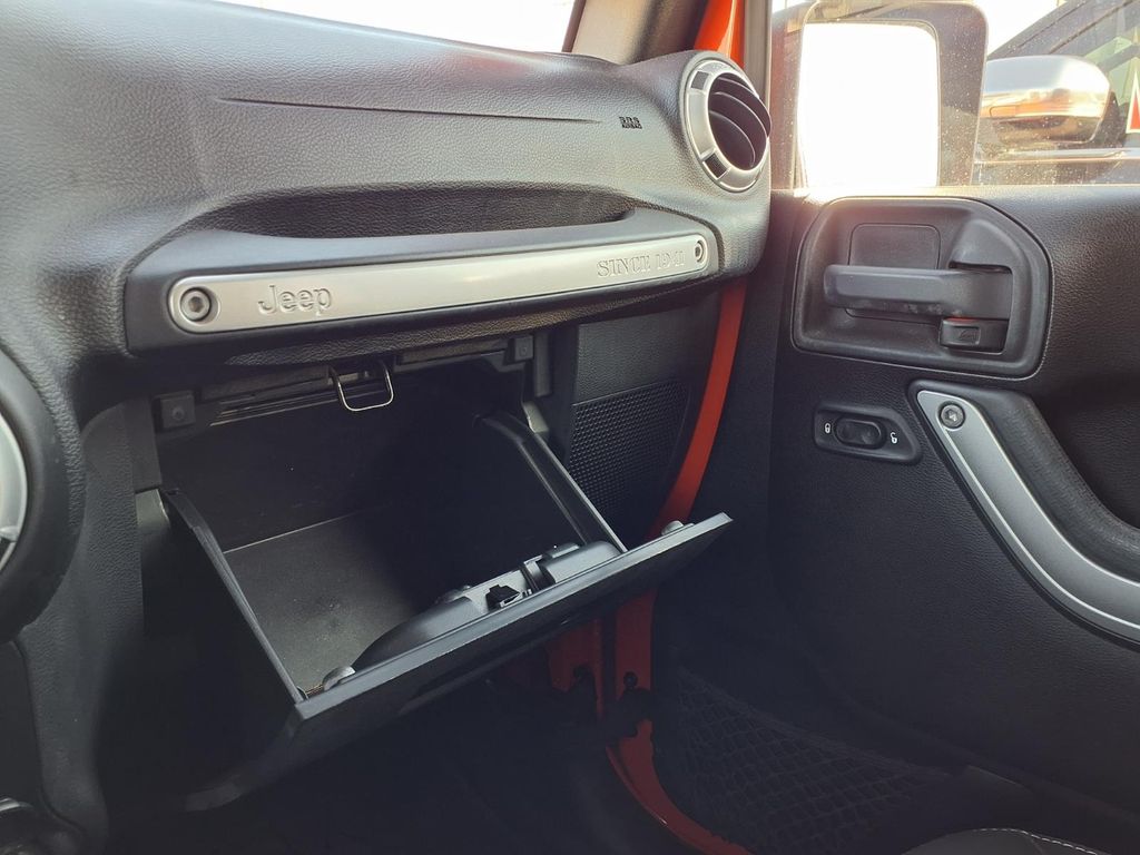 2015 Jeep Wrangler Unlimited Sahara Orange at Emmons Autoplex