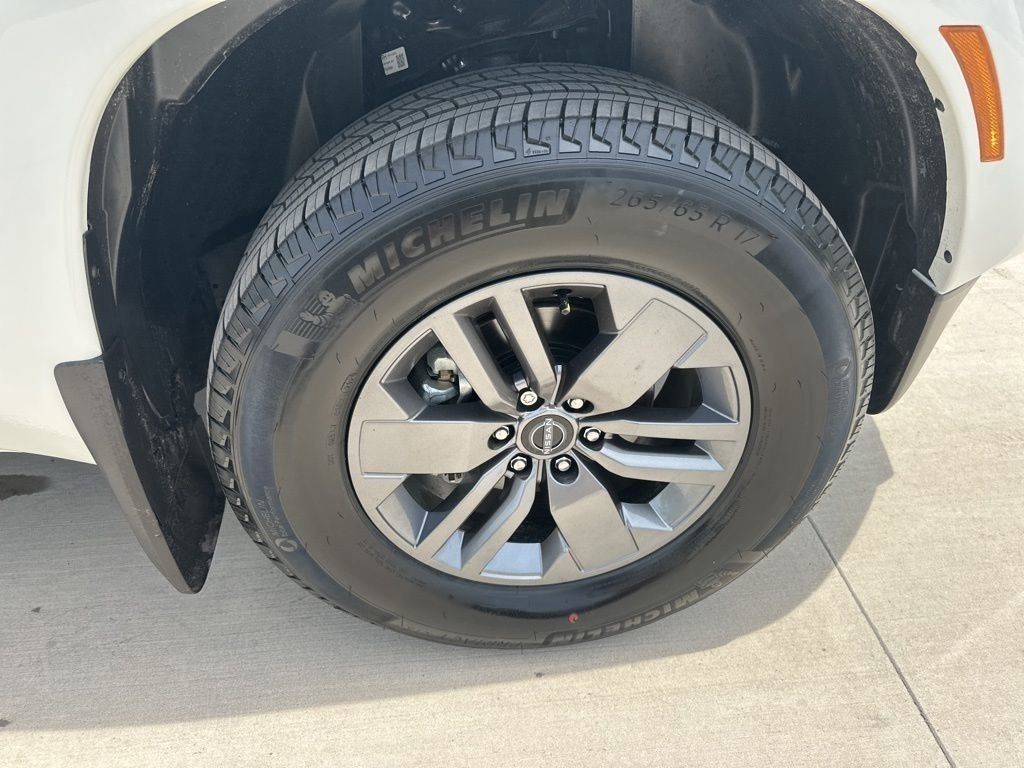 2025 Glacier White Nissan Frontier SV RWD Truck