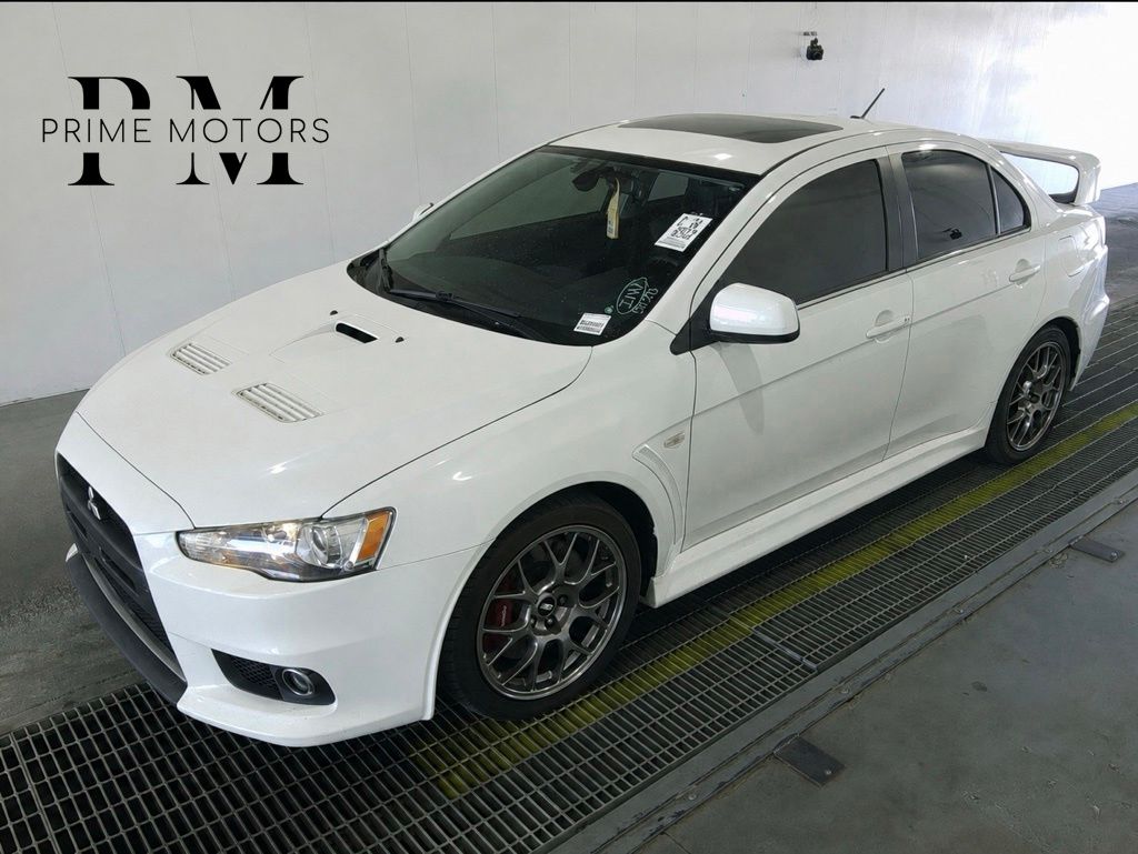 White 2014 Mitsubishi Lancer Evolution Sedan All-Wheel Drive 6-Speed Automatic