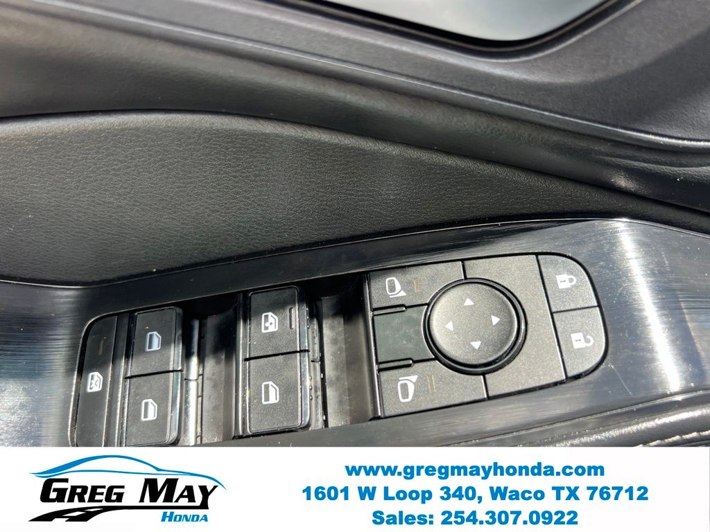 2024 Nissan Rogue SV Black at Greg May Honda