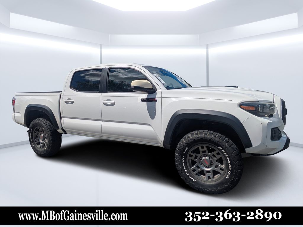 Super White 2019 Toyota Tacoma Pickup Truck Four-Wheel Drive 6-Speed Manual