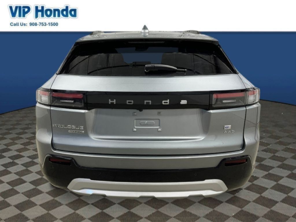 View vehicle photo 4