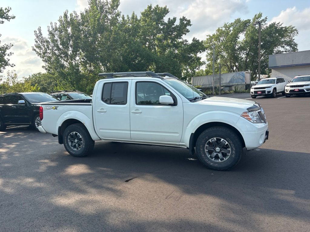 Glacier White 2015 Nissan Frontier Pickup Truck Four-Wheel Drive 5-Speed Automatic Overdrive