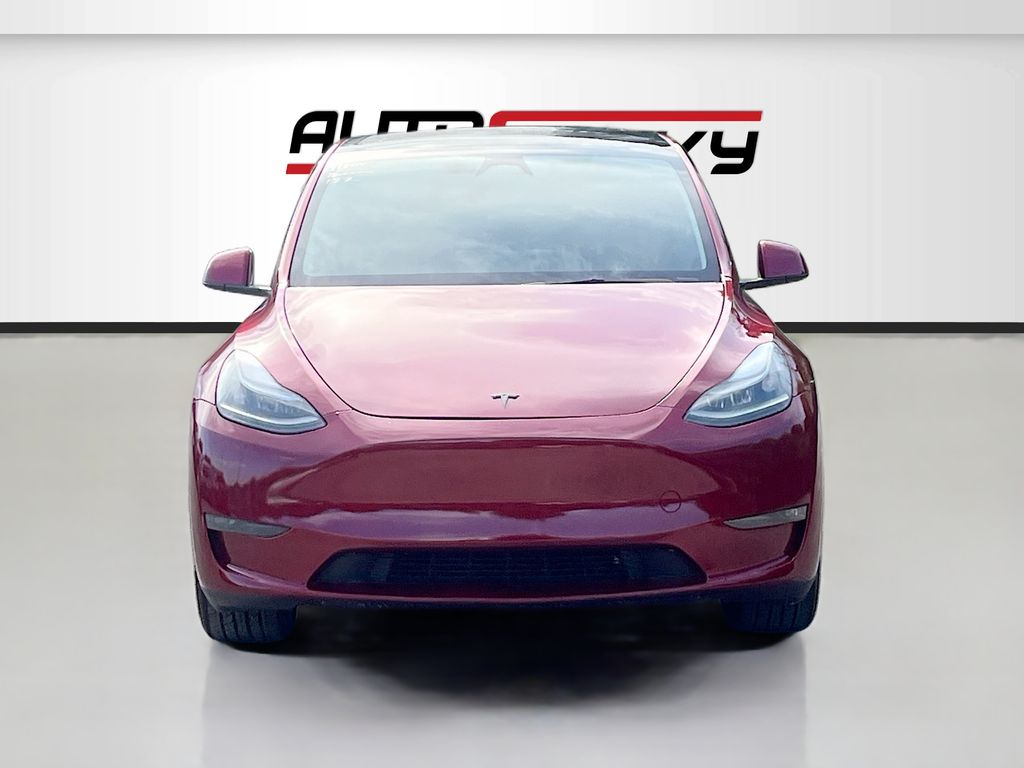2025 Tesla Model Y Long Range Red at AutoSavvy Houston Northwest