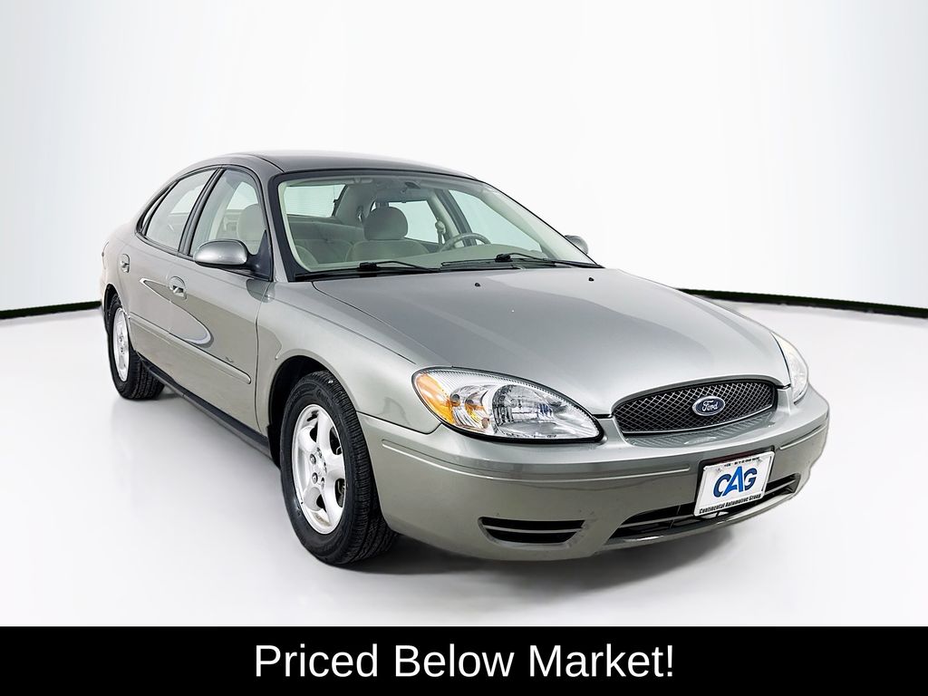 Champagne 2004 Ford Taurus SES Sedan Front-Wheel Drive 4-Speed Automatic Overdrive