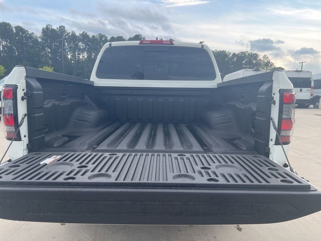 2025 Glacier White Nissan Frontier S 4X4 Truck