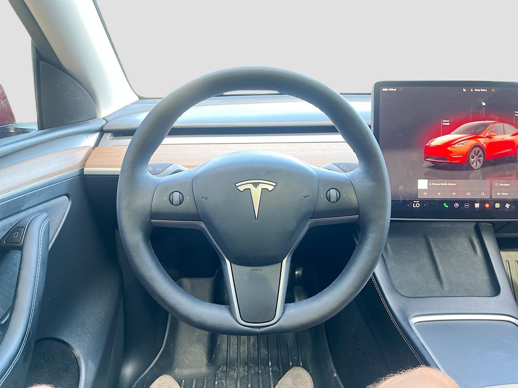 2025 Tesla Model Y Long Range Red at AutoSavvy Houston Northwest
