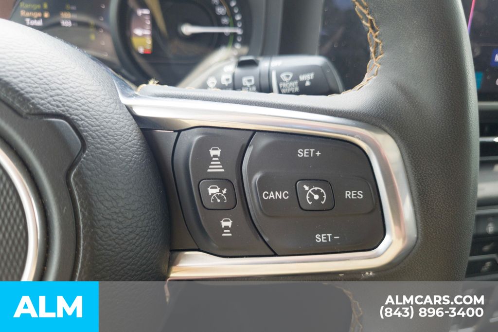 Used 2024 Black Jeep Sahara 4xe image 10