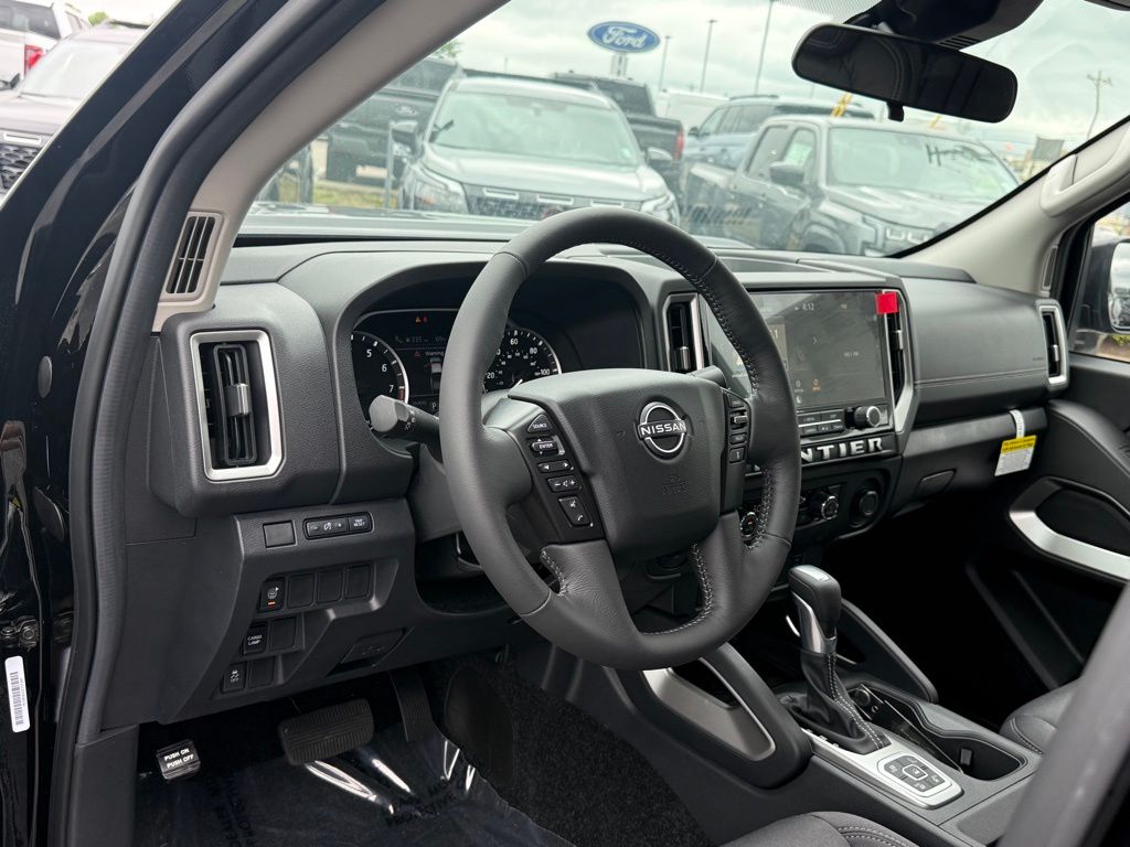 View vehicle photo 3