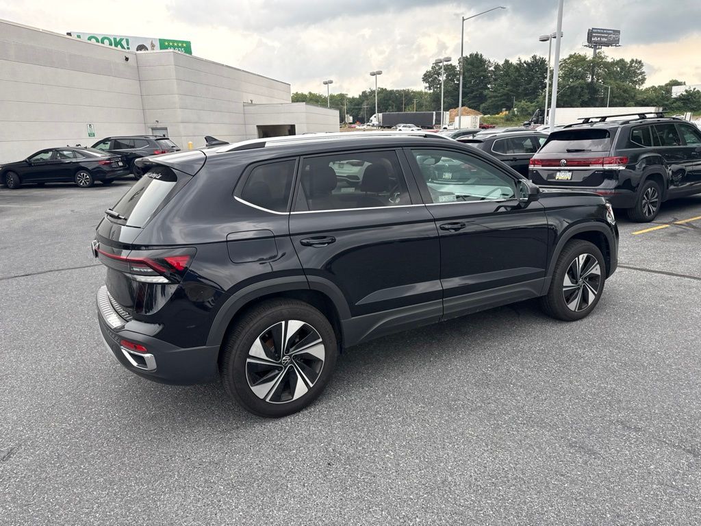 2025 Volkswagen Taos 1.5T SE Black at Sutliff Volkswagen