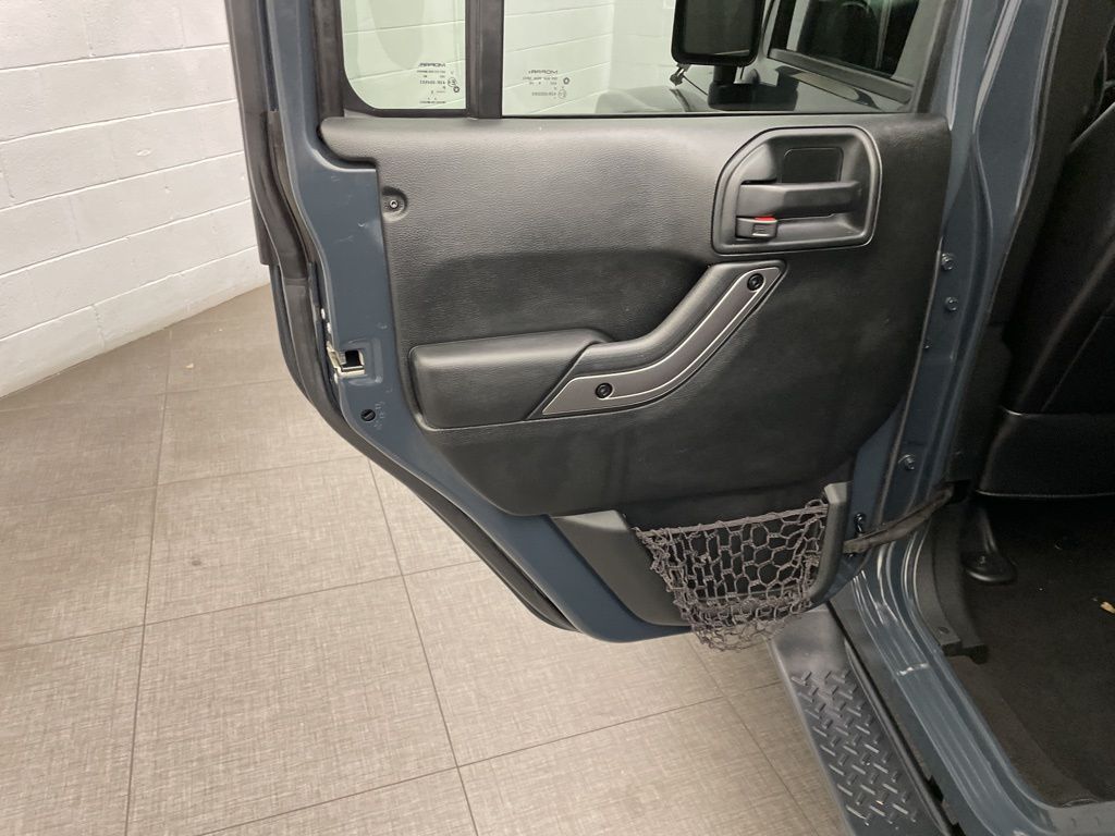 Used 2018 Black Jeep Unlimited Sahara image 22