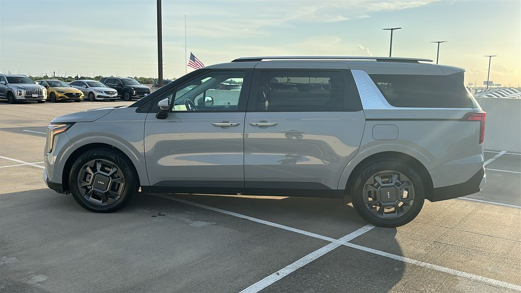 2026 Kia Carnival Hybrid EX White at Shottenkirk Kia Fort Bend