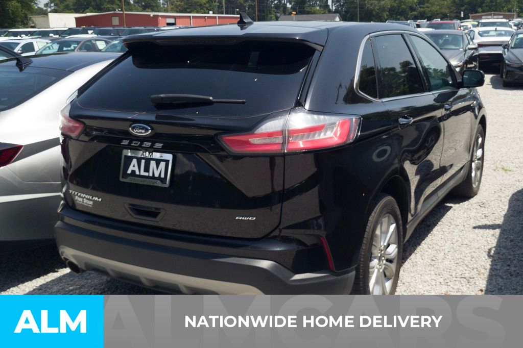 Used 2022 Black Ford Titanium image 4