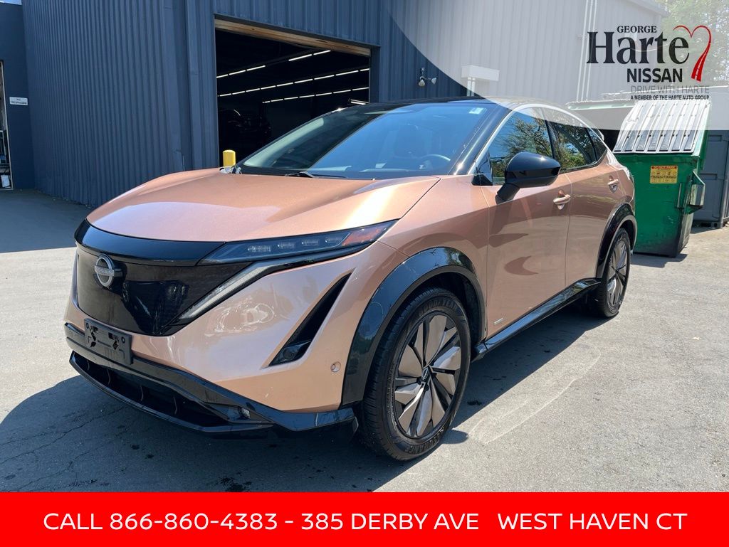 Red (Sunrise Copper Pearl/Black Diamond Pearl) 2023 Nissan Ariya SUV / Crossover Front-Wheel Drive Continuously Variable Transmission