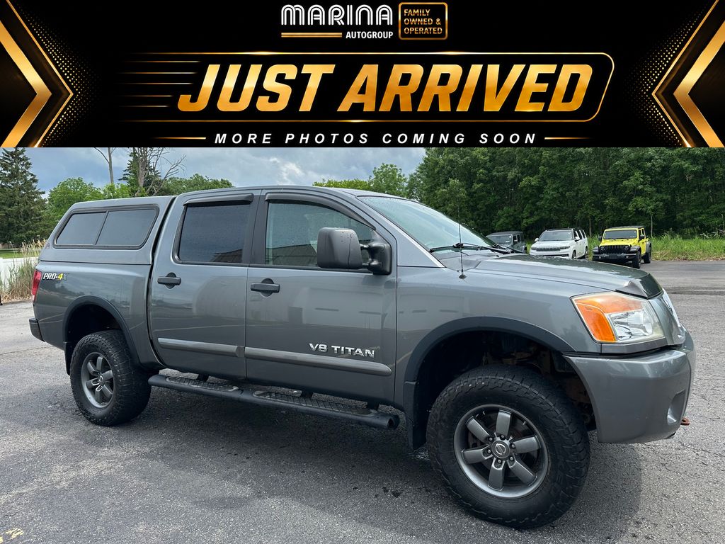 Gray (Gun Metallic) 2014 Nissan Titan Pickup Truck Four-Wheel Drive 5-Speed Automatic