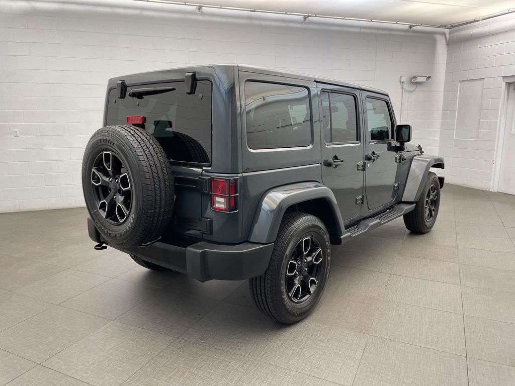 Used 2018 Black Jeep Unlimited Sahara image 5
