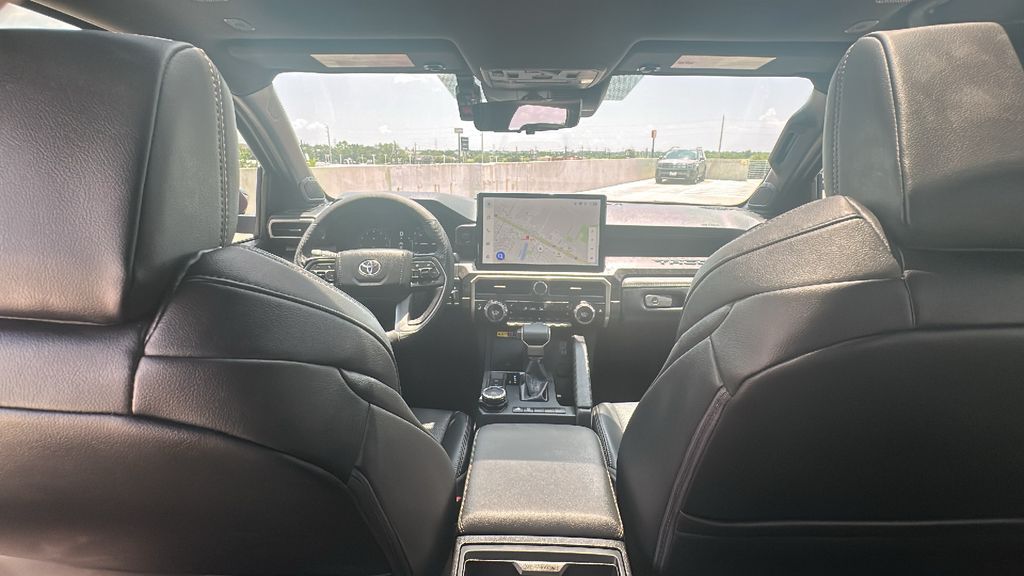 2026 Toyota Tacoma Hybrid Limited Red at EAG Ford Navasota