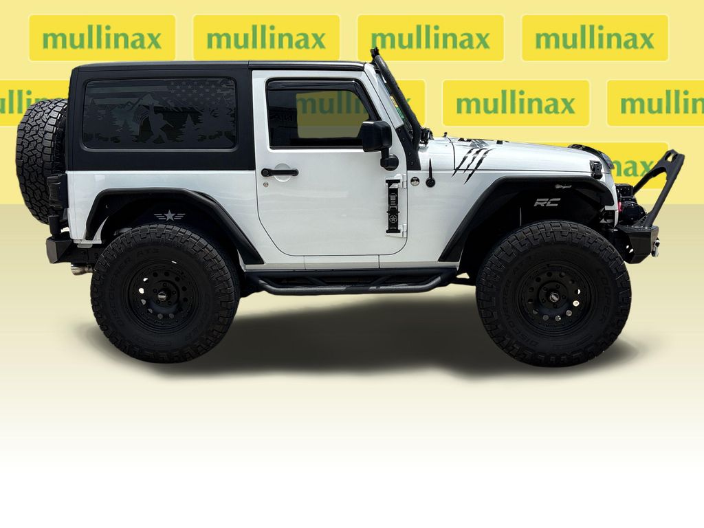 Used 2016 White Jeep Sport image 2