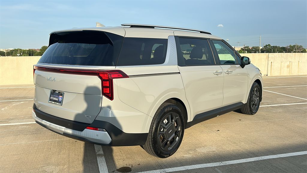 2026 Kia Carnival Hybrid EX White at Shottenkirk Kia Fort Bend