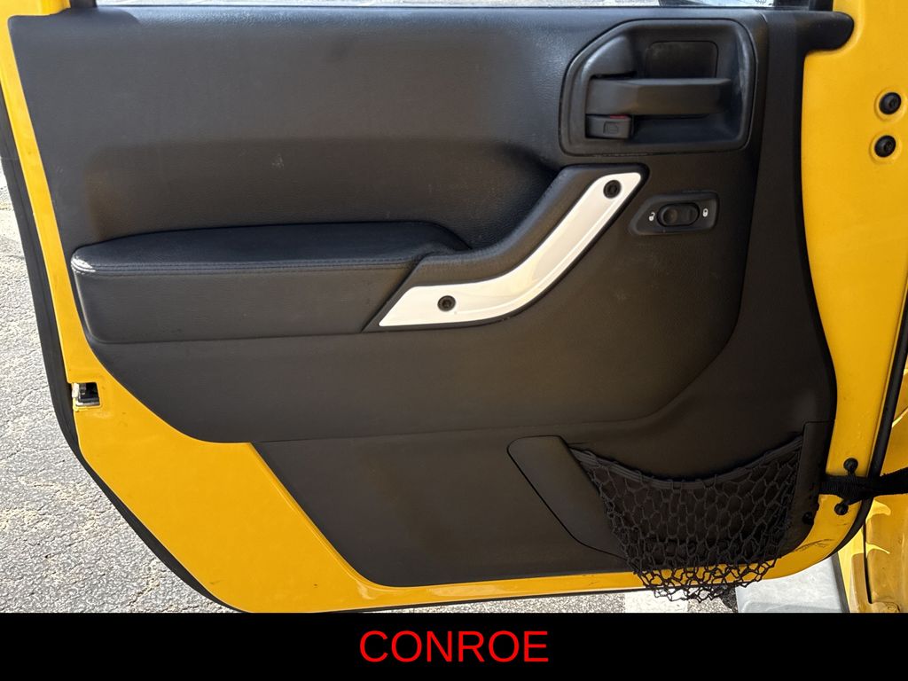 2015 Jeep Wrangler Unlimited Sahara Yellow at Bayshore Chrysler Jeep Dodge Ram