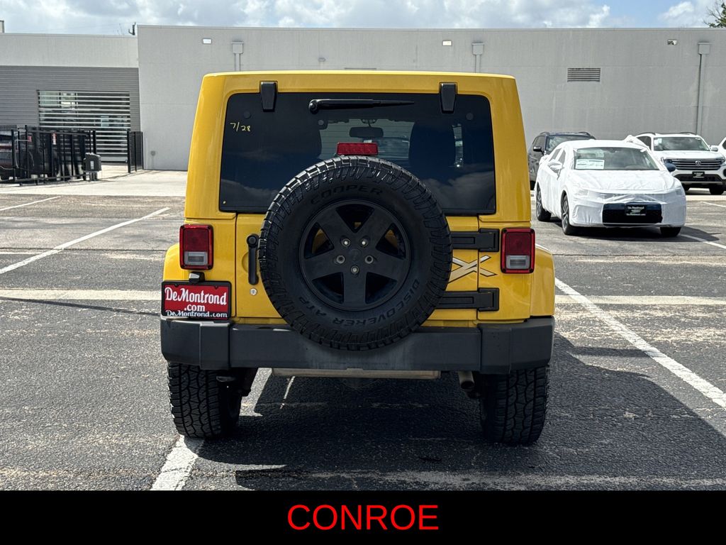 2015 Jeep Wrangler Unlimited Sahara Yellow at Bayshore Chrysler Jeep Dodge Ram