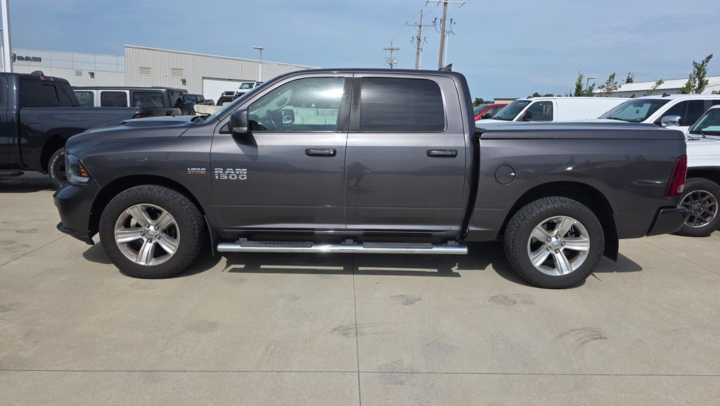 Used 2015 RAM Ram 1500 Pickup Sport with VIN 1C6RR6MT0FS592315 for sale in Kansas City