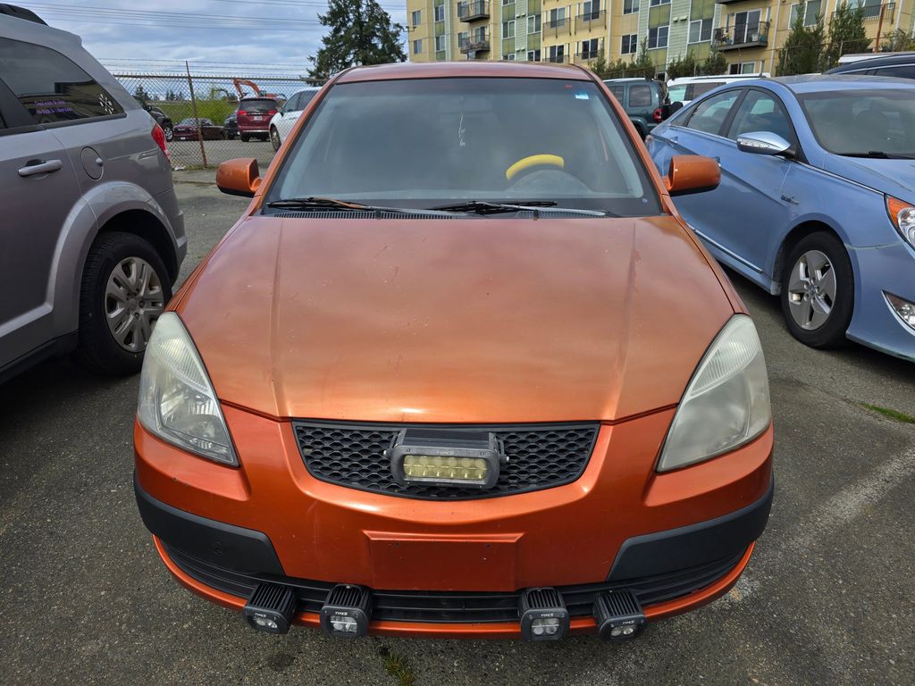 Orange 2008 Kia Rio LX Sedan Front-Wheel Drive 4-Speed Automatic Overdrive