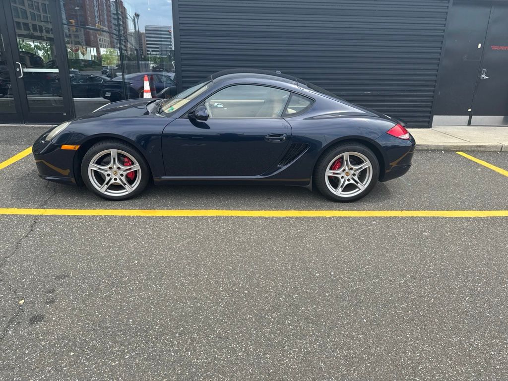 Dark Blue Metallic 2010 Porsche Cayman Coupe Rear-Wheel Drive 7-Speed Automatic