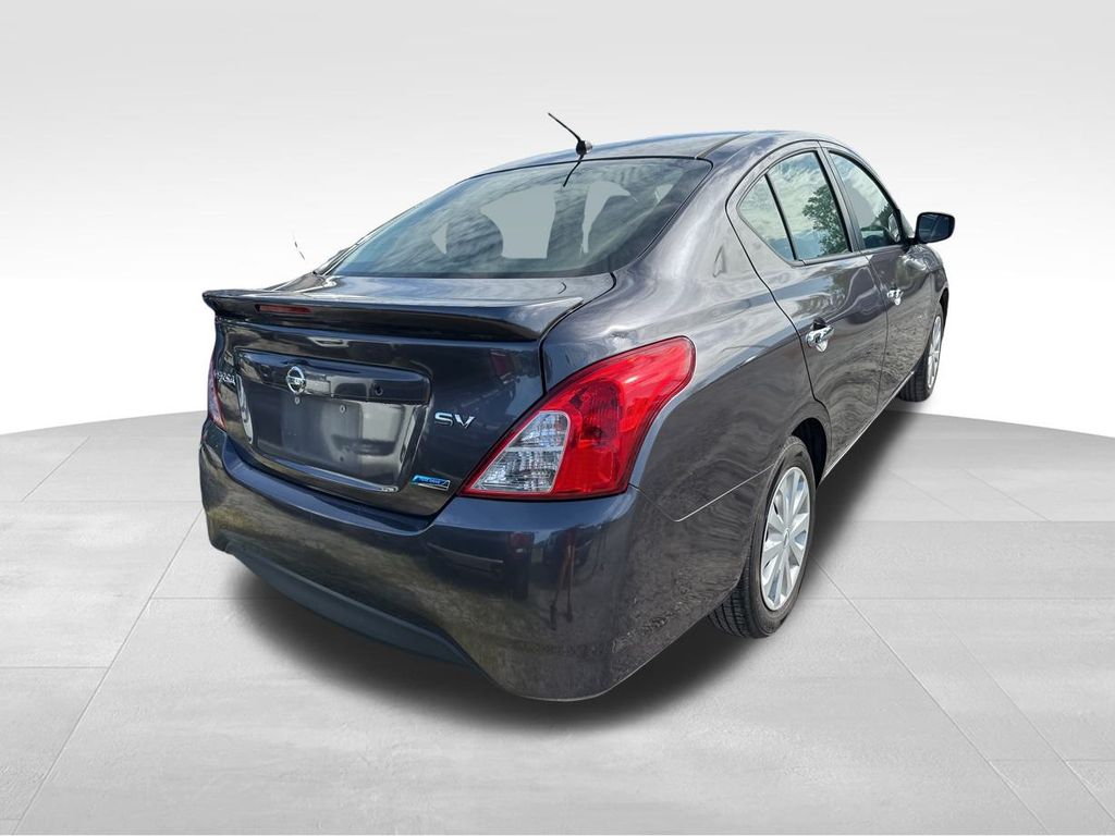 2015 Amethyst Gray Nissan Versa 1.6 SV FWD Sedan