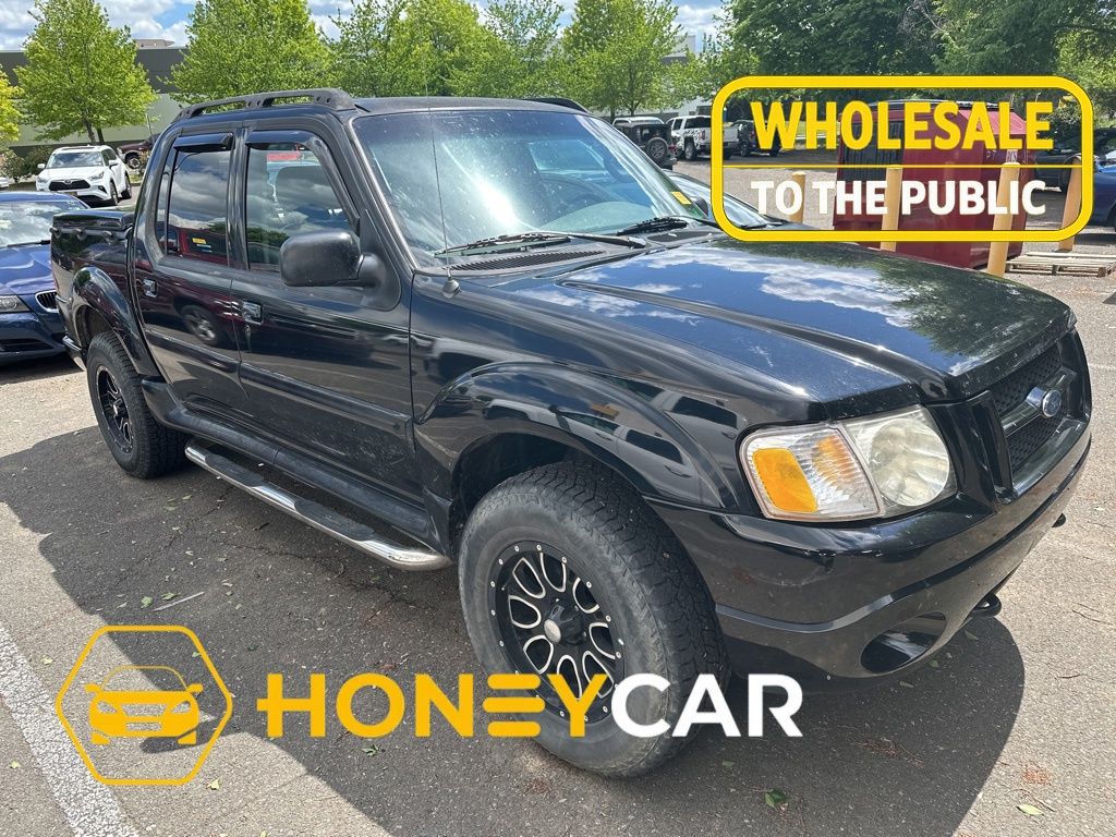 Black Clearcoat 2004 Ford Explorer Sport Trac XLS 4WD Crew Cab Pickup Truck Four-Wheel Drive 5-Speed Automatic Overdrive