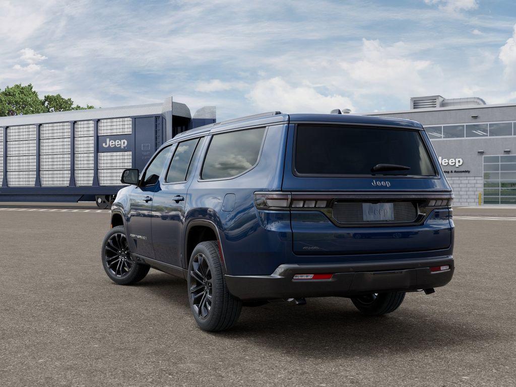 New 2026 Fathom Blue Pearlcoat Jeep Summit Obsidian image 3