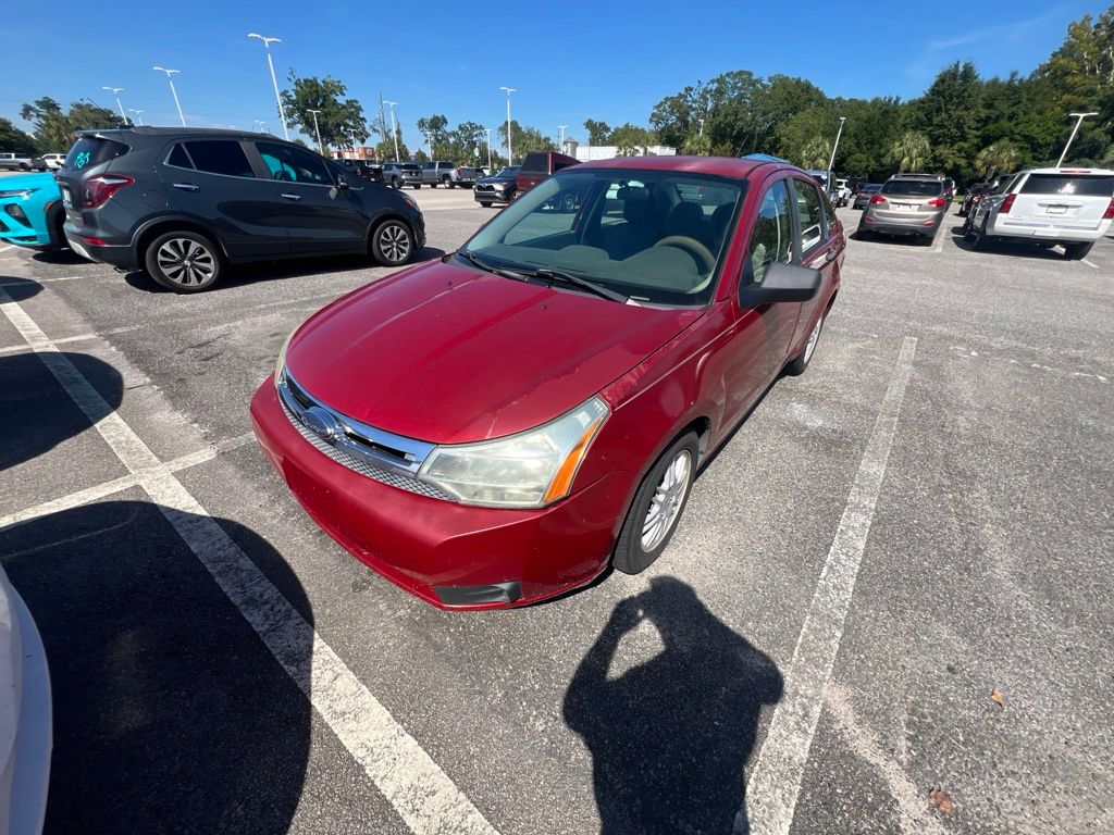 Red 2010 Ford Focus Sedan Front-Wheel Drive