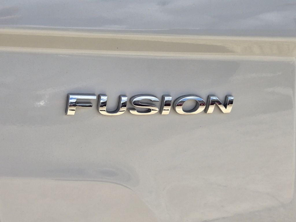 2012 Ford Fusion Hybrid Base White at Shottenkirk Kia Fort Bend